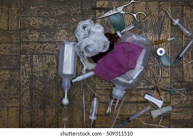 Bunch Of Used Medical Supplies Laid On The Floor, Overhead Shot