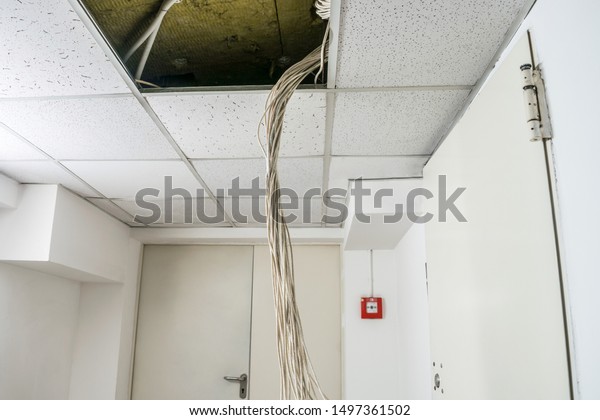 Bunch White Wires Hang Suspended Ceiling Royalty Free