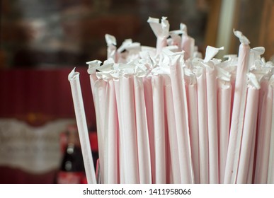 Bunch of wrapped red straws