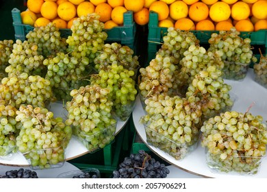 Bunches Of Ripe Juicy Grapes In A Tray On The Counter. The Concept Of Fortification.