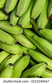 Bunches Of Unripe Banana At Outdoor Market Stall. Sao Paulo City, Brazil.