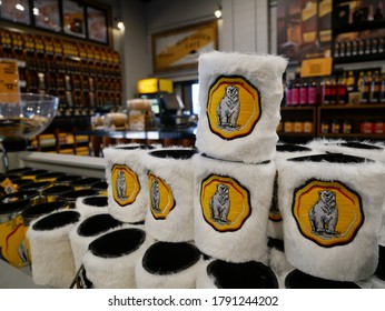 Bundaberg, Queensland / Australia - 09 23 2019: Polar bear on a fluffy stubby holder of Bundaberg rum at the gift store