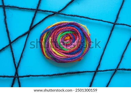 Bundle of colorful threads. Concept of unity, allyship, and resilience.