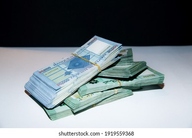 Bundle Of Lebanese Lira Bank Notes On White Ground