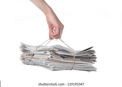 Bundle Of Newspaper Tied With String Ready For Recycling