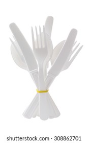 Bundle Of Plastic Cutlery Standing On White Background