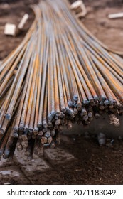 Bundle Of Rusty Rebar On A Construction Site, Selective Focus.