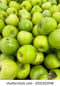 A Bundle Of Stacked Green Apples