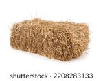 bundle of straw in front of white background