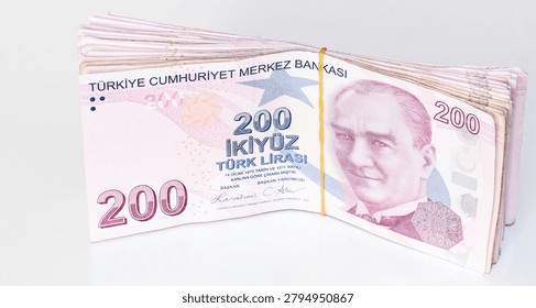 Bundle of Turkish Lira 200 banknotes.Stack of 200 TRY cash money with rubber band.