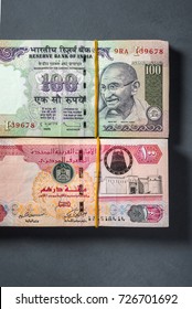 Bundle Of UAE Dirhams And Indian Rupee Currency Notes Placed Side By Side. Trade, Business And Remittance Between India And United Arab Emirates.