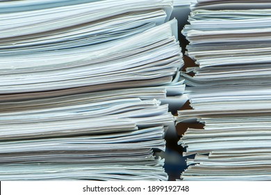 Bundles Bales Of Paper Documents. Stacks Packs Pile On The Desk In The Office