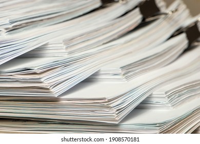bundles bales of paper documents. stacks packs pile on the desk in the office