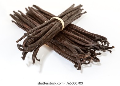 Bundles of vanilla pods from Madagascar tied with raffia