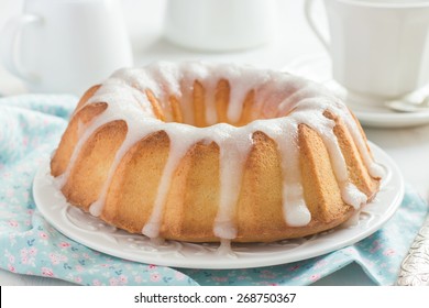 Bundt Cake  With Sugar Glaze On White Background