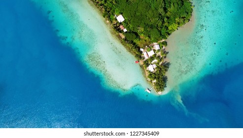 bungalows and villas in the pacific islands in aerial view, French Polynesia - Shutterstock ID 1227345409