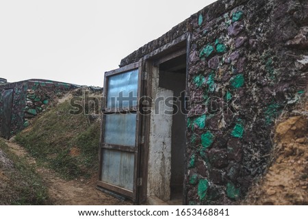 Bunker for protecting the enemy from invading frontline.
Military bunker base in warzone. Military controlled area