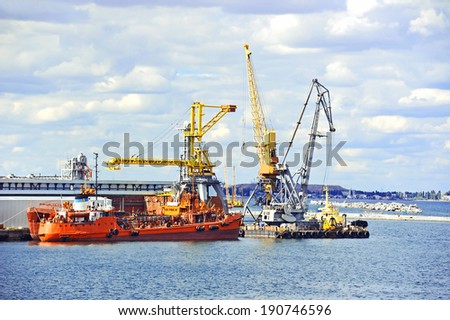 Bunker ship (fuel replenishment tanker) under port crane, Odessa, Ukraine