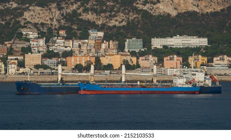 Bunkering operation between bunker vessel and another vessel at Gibraltar anchorage