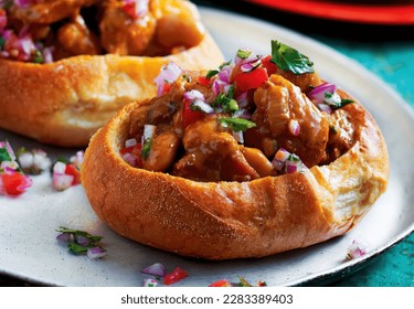 Bunny Chow. The origin of Bunny Chow came from Durban (South Africa) and was first created by the Indians living in this area