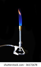 A Bunsen Burner Showing Flame And Hose.