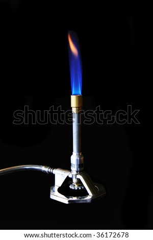 A Bunsen burner showing flame and hose.