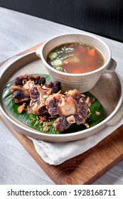 Buntut Goreng Or Fried Oxtail Served With Clear Soup