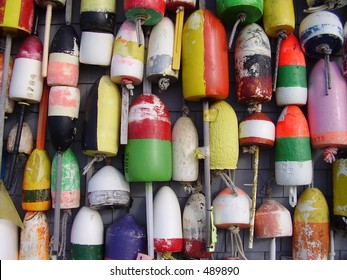 Buoys On The Side Of A Beach Shack