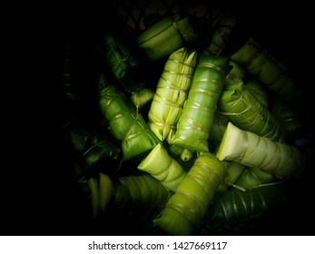 Burasa. Indonesian Food Made From Sticky Rice Wrapped In Banana Leaves And Steamed.