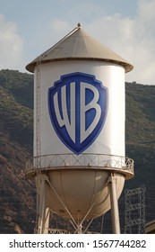 Burbank, CA / USA - Nov. 21, 2019: The New Warner Brothers Company Logo Is Shown On An Temporary Wrap On The Iconic Studio Lot Water Tower. The New Shield Redesign Will Soon Be Painted On The Tower.