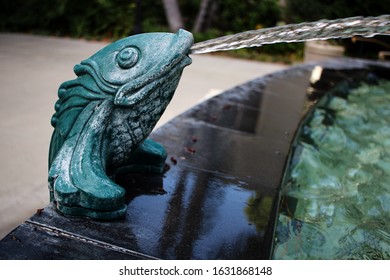 Burbank, California - April 18 2015: A Green Fish Spitting Water At A Fountain, At The Art Deco City Hall.