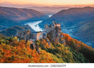 Burg Aggstein, Austria. Beautiful landscape with Aggstein castle ruin and Danube River at sunset in Wachau valley Austria. Amazing medieval ruins.