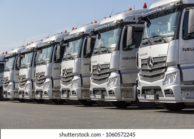 BURG / GERMANY - JUNE 11, 2017: German Mercedes Benz Actros Trucks From Haulage Firm Neumann Stands In A Row.