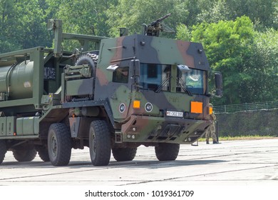 BURG / GERMANY - JUNE 25, 2016: German Military MAN Multi 2 Swap Body Truck Tanker At Open Day In Barrack Burg