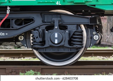 Burgas, Bulgaria - March 20, 2017 - Freight cargo train Wheel - 4axled box wagon Type:Eanos Model:155-1 - Transvagon AD