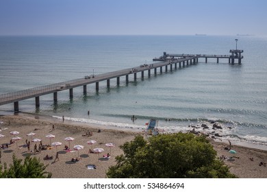 Burgas - July 29: Beach and sea bridge in the background of blue sky on July 29, 2016 Bourgas,