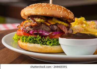 Burger With Bbq Sauce And Chips