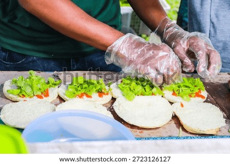 A burger bun is a type of bread specifically made to serve as a base or topping for burgers. These buns are typically round with a soft, fluffy, and slightly sweet texture. Burger buns are typically golden yellow in color due to the butter and egg content.