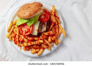 burger and french fries. the concept of junk food. top view. white background. Copy space for your text - Powered by Shutterstock