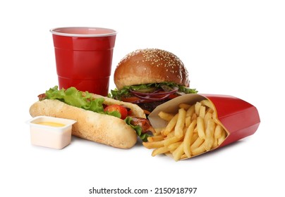 Burger, French fries, hot dog, dip sauce and refreshing drink on white background. Fast food - Powered by Shutterstock