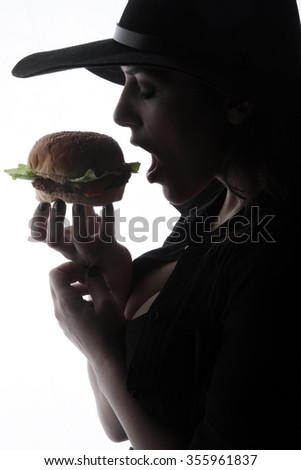 burger hamburger American junk fast food beautiful brunette girl with red lipstick on beautiful lips and beef burger with grilled bacon  hungry facial expressions 