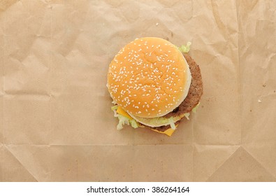 Burger On Paper Background. Top View