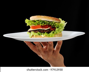 Burger on plate at restaurant - Powered by Shutterstock