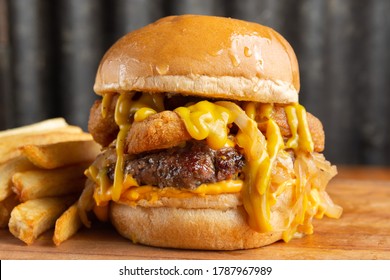 
Burger With Onion Rings And Cheese