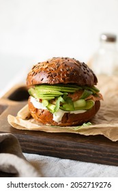 burger with salmon and avocado