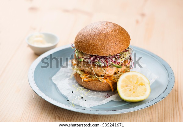Burger with salmon and\
avocado