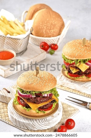 A burger is a type of round bread that is sliced ​​in half, and in the middle is filled with a patty which is usually made from meat, then vegetables.