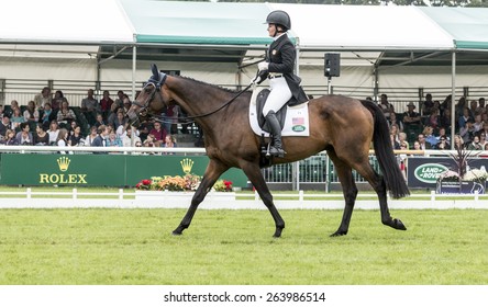 Burghley, Stamford/UK - September 5, 2014: American Hannah Sue Burnett Guides 11 Year-old Irish Sport Horse Habour Pilot Through The Dressage Event At The Land Rover-Burghley Horse Trials.