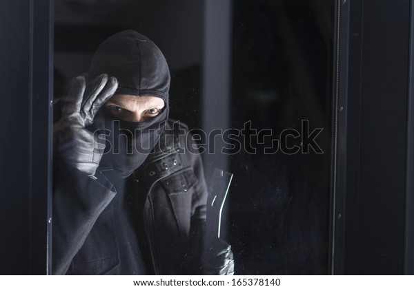 Burglar Stock Photo 165378140 | Shutterstock