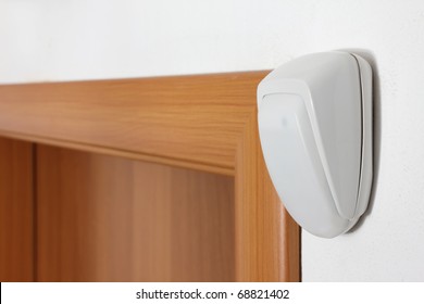 Burglar Alarm Movement Sensor On White Wall